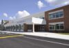 Fentanyl Chaos—Board Shrugs Off Testing Modern school building with large windows and a clear sky