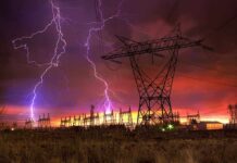Hybrid War Watch: Poland On Edge Lightning strikes illuminate a power station against a colorful sunset sky
