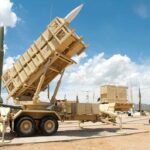 Missile Deal Sparks U.S.–China Showdown Patriot missile defense system on display outdoors with various missiles in the background