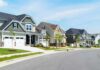Four Million Homes—Just Missing Suburban street with modern two-story houses