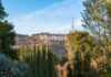 Prior Felon Tied To Hollywood Killings Hollywood Sign on hillside framed by trees