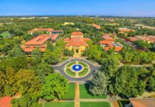 Penn State Frats Named In Coke Ring Aerial view of a university campus with central fountain and red-tiled buildings
