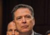 man in suit at a hearing