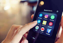 Age Gates Incoming: Platforms On Notice Finger tapping smartphone social media app icons.