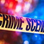 Kratom Twist Shadows Two Ole Miss Deaths Crime scene tape with blurred emergency lights in background