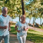 Brain Boost in 16 Minutes Older couple jogging on a lakeside path