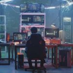 Silicon Valley Panic: Slowdown Plan Leaked People working at computers in a dim server room
