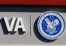 9/11 Fallout: VA Rules Get Upended VA logo and Department of Veterans Affairs seal on building wall
