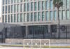 Middle East Warning: Flights Could Vanish Embassy building behind tall black security fence