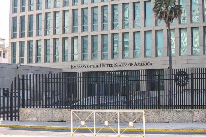 shutterstock_1830525032 Embassy building behind tall black security fence