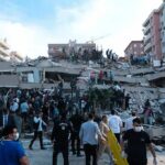 Athens Blast Horror – Americans Vacation Turns Deadly Rescue workers and civilians on collapsed building after earthquake