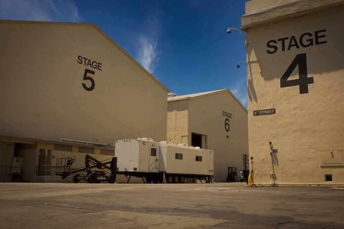 Film studio stages with numbered buildings and trailer