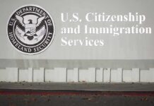 USCIS building sign with DHS seal