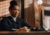 Judge in courtroom speaking from the bench