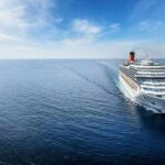 Three Days, Four Kids, Mom In Bahamas Cruise ship sailing on calm blue ocean