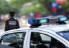 Record Crime Drop Stuns America police car roof with blue emergency lights