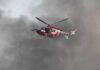 News Chopper Plunges Mid-Coverage Rescue helicopter hovers amid thick smoke