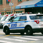 Selma Blair Air-Rage Bombshell Police car and ambulances outside emergency room entrance.