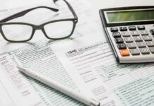 Meta’s Bold Bet: Free Eyes For Vets Tax forms with calculator, glasses, and pen