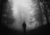Brutal Hike Murder: Death Penalty Vanishes Hiker walking alone on a foggy forest path