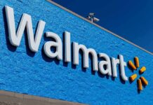 Walmart storefront sign on bright blue exterior wall