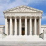 Bond Hearings Axed? Justices Weigh Bombshell Front view of the Supreme Court building with large columns and steps under a blue sky