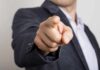 Trump Signals Firing – What Triggered It? hand pointing directly at the camera