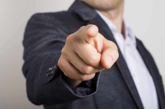 shutterstock_146536856 hand pointing directly at the camera