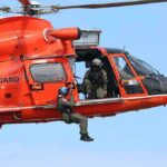 Coast Guard Scrambles – Jet Suddenly Missing Rescue helicopter with crew performing hoist operation