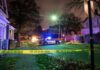 Campaign Sign Run Turns Nightmare Police car blocks residential street at night behind caution tape