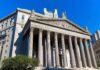 neoclassical courthouse with tall columns and pediment sculptures