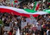 Torture Confessions? UN Slams Iran Hangings Protest crowd with flags and signs; Seyed Ebrahim Raisi, La Parka, Brian Robiskie, Philly Brown, Miguel Francisco Barragán Andrade present