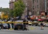 Homecoming Turns To Mayhem Police investigate a taped-off urban street crime scene