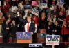 Coast-to-Coast Gambit: Trump Blitz Begins Donald Trump addresses a rally crowd at a podium, raising his fist