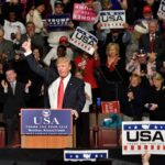 Coast-to-Coast Gambit: Trump Blitz Begins Donald Trump addresses a rally crowd at a podium, raising his fist