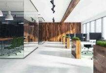 FBI Pounces After OpenAI Room Bugged Modern open-plan office with wood accents and glass meeting room